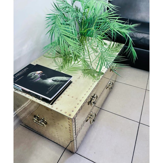 MidCentury campaign style brass clad two drawers coffee table sign by Sarreid Ltd. Circa 1960s