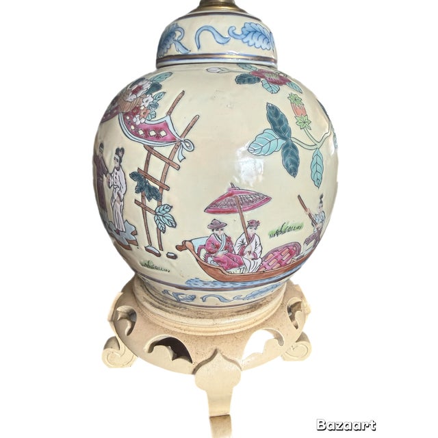 Add classic Hollywood Regency or Chinoiserie charm to your space with this vintage mid-20th-century table lamp. The base...
