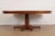 A gorgeous mid-century Regency or Neoclassical style pedestal extension dining table Attributed to John Widdicomb USA,...