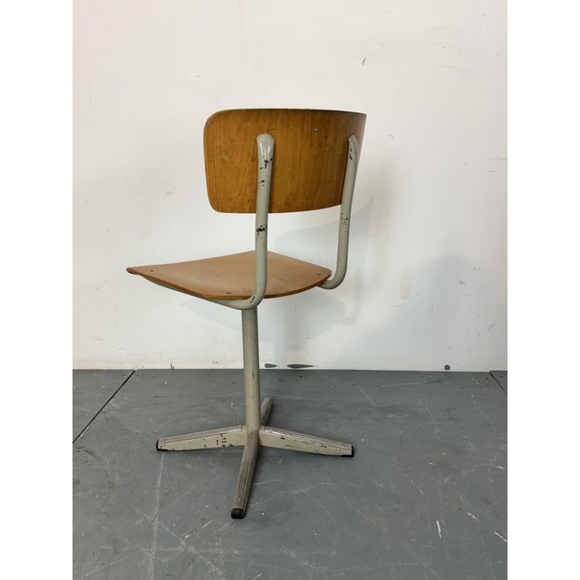 Vintage Marko Mid Century Industrial Office Desk Chair, 1950s The chair is in good original condition. This piece has an...