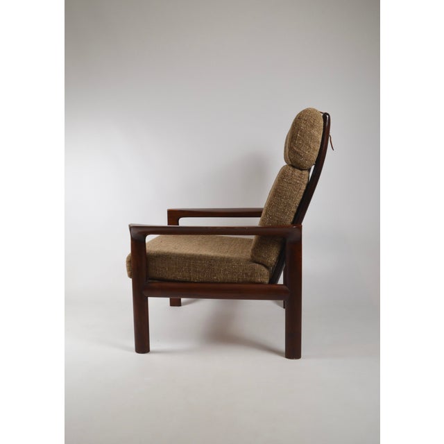 Exceptional pair of Borneo lounge chairs designed by Sven Ellekaer for Komfort, Denmark, 1960s. An iconic example of...