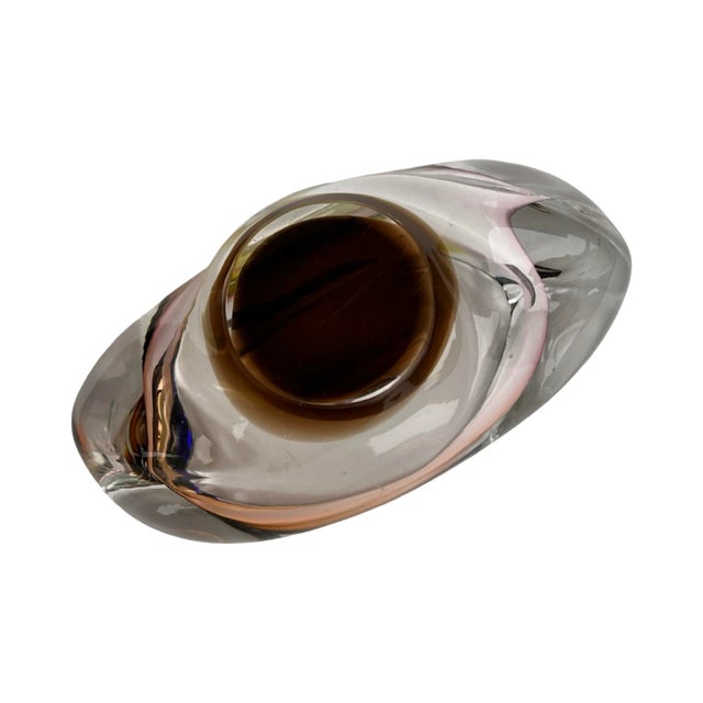 An artistic ashtray made of blown glass with a dynamic, organic form, designed by Jozef Rozinek for Borocrystal Nový Bor...