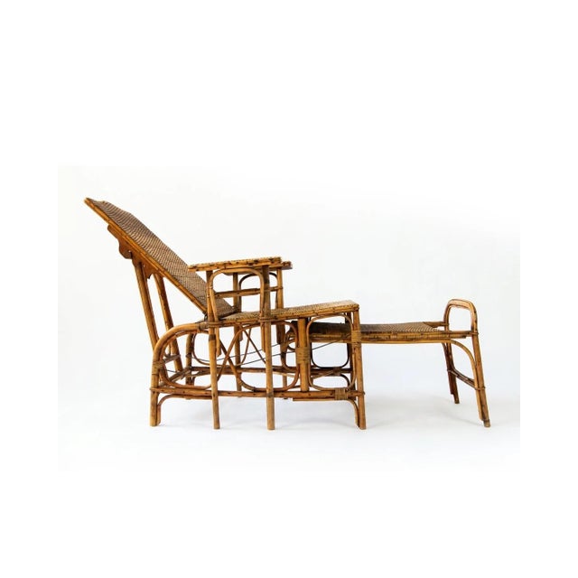French Riviera Rattan Recliner Chair, 1920s Early 20th century French Riviera recliner chair in rattan and bamboo. Well...