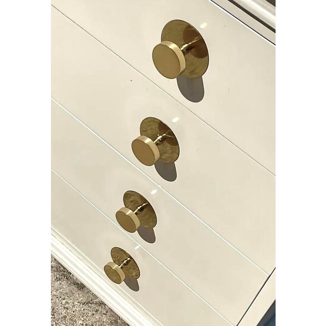 Elevate your interior with this iconic vintage credenza by the celebrated American maker, American of Martinsville. This...