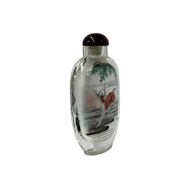 This piece of art features a mesmerizing glass bottle vase adorned with intricate Chinese-inspired oriental scenery. The...