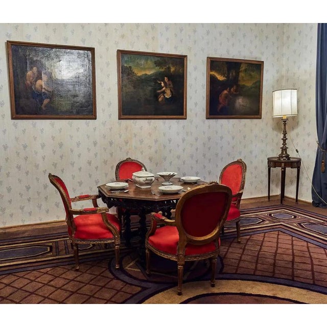 Dining table made in the late 19th century in the Renaissance style with rich carvings depicting eagles and oak leaves at...
