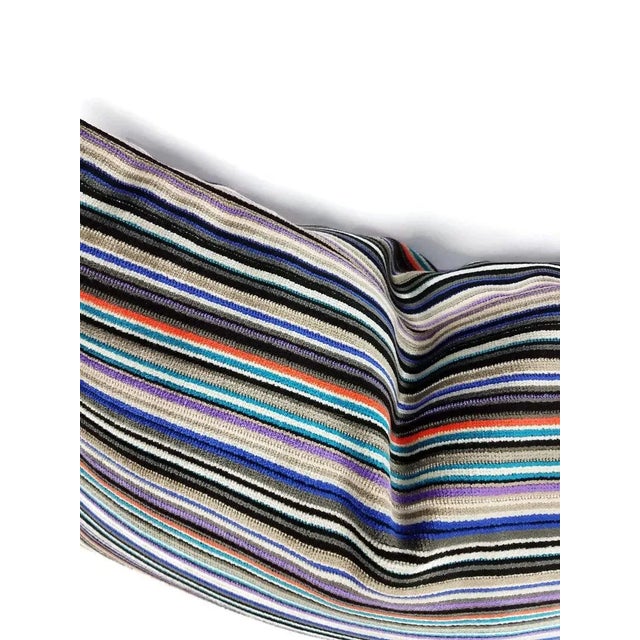 A multi-colored stripe heavy-duty velvet pillow cover. This pillow has black, silver, turquoise, blue, purple, and hint of...