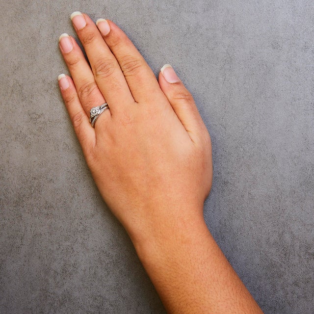 Early 21st Century .925 Sterling Silver 1/4 Cttw Diamond Halo and Swirl Engagement Ring and Wedding Band Set (I-J Color, I3 Clarity)- Ring Size 9 For Sale - Image 5 of 6