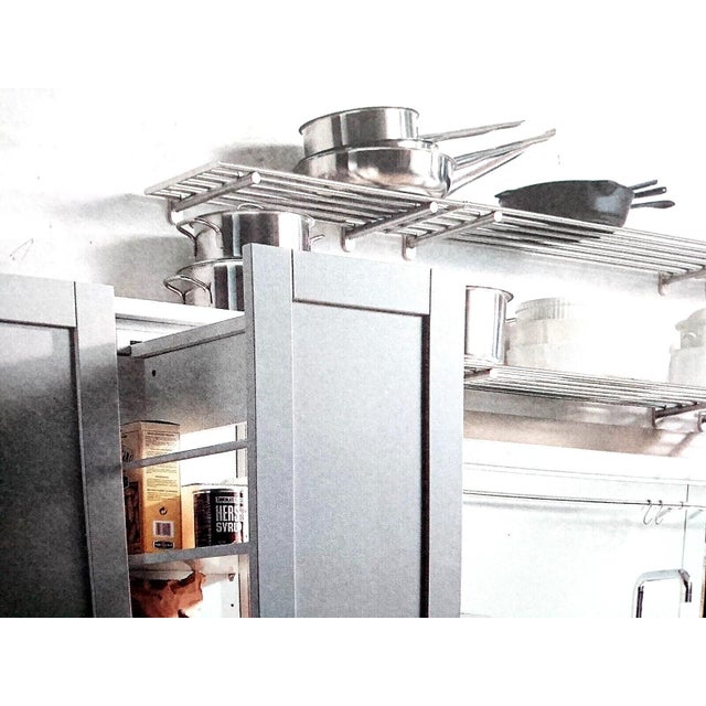 Hello! This listing is for a set of stunning Bulthaup steel shelving units. There are 3 steel shelves along with 6...