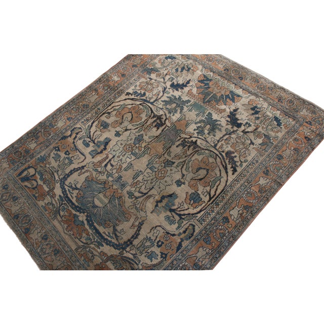 Hand-knotted in wool originating from circa 1860-1870, this 4 x 5 antique Persian rug connotes a traditional Doroksh rug...