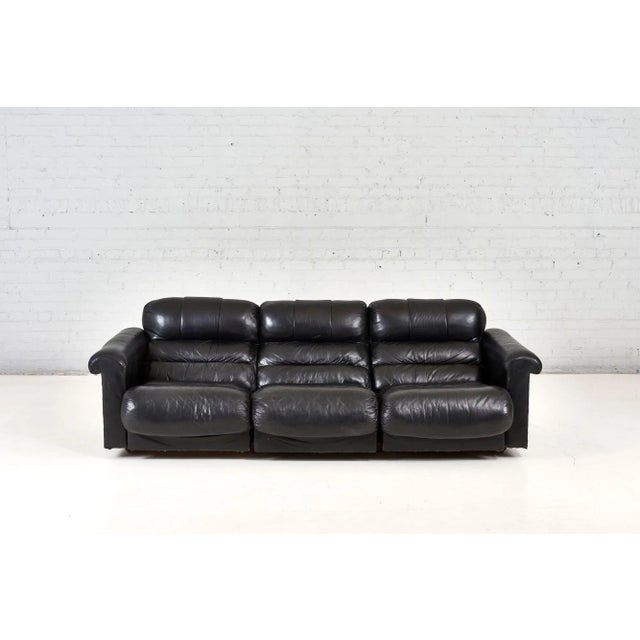 De Sede Black Leather Sofa, 1970. Original leather and each seat individually reclines.