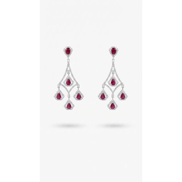 Diamond weight: 1.27 cts Ruby weight: 3.61 cts 14K gold Gross weight: 12.88 grams Gold weight: 11.90 grams CODE: SW