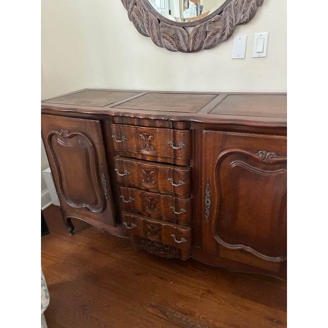 I believe it is cherry , hardwood,. Top surface has framed paneled serts on top not quite as hard. Beautiful details,...