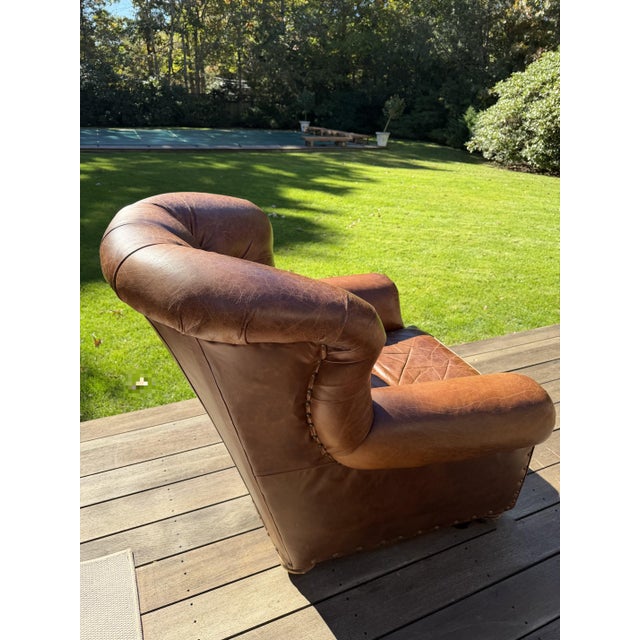 Restoration Hardware Leather Lounge Club Chair Upholstered in rich, cognac-brown leather, this generously scaled Churchill...