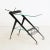 H: 71cm W: 83cm D: 42cm An Italian mid-century modern design bar cart with black anodized metal, antennae handles and...