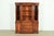 An exceptional Georgian or Chippendale style breakfront bookcase or dining cabinet By White Furniture USA, Circa 1960s...