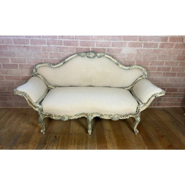 A poetic expression of 18th-century romance, this exquisite Corbeille settee is a vision of faded grandeur. With its...