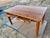 The Vintage Mid Century Modern Walnut Library Table by The Jasper Desk Company from 1959 is a stylish and functional piece...