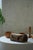 A highly decorative hand-carved African stool dating from the mid-20th century. Carved from a single piece of wood, the...
