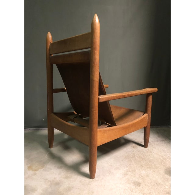 A rare chair in very good vintage condition with great patina to the leather - 104×68.5×76 cm