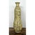 This vintage ceramic vase presents a tall, elegantly tapered gourd-like silhouette, its slender neck flaring gently to a...