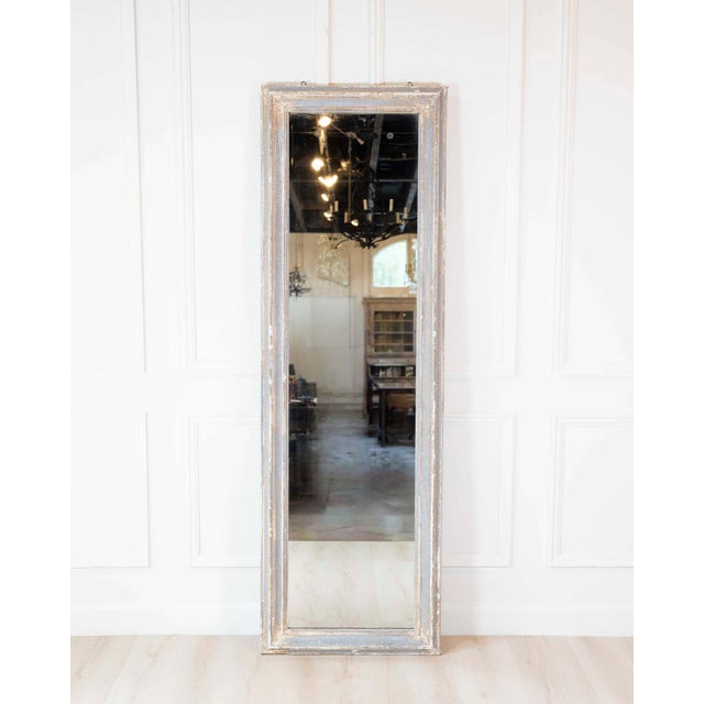 An elegant 19th century antique French dressing mirror retaining its beautifully aged original painted finish and...
