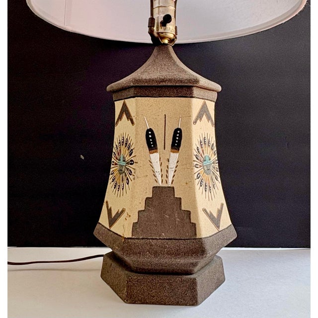 Large vintage Southwestern table lamp, circa 1980s, featuring Native American-inspired geometric motifs and a warm earth-...