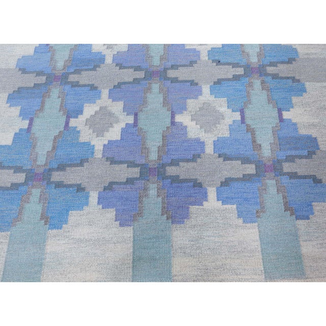 Vintage Swedish flat woven rug by Judith Johansson Size: 6'8" × 9'4" (203 × 284 cm) This striking vintage Swedish flat-...