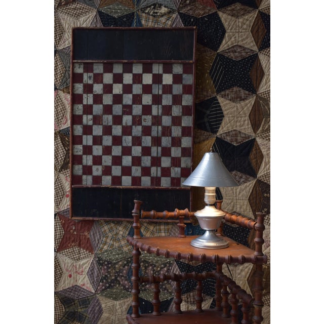 Antique Folk Art Polychrome Pine Checkerboard, Circa Early 20th Century. Constructed from four pine boards with edge trim...