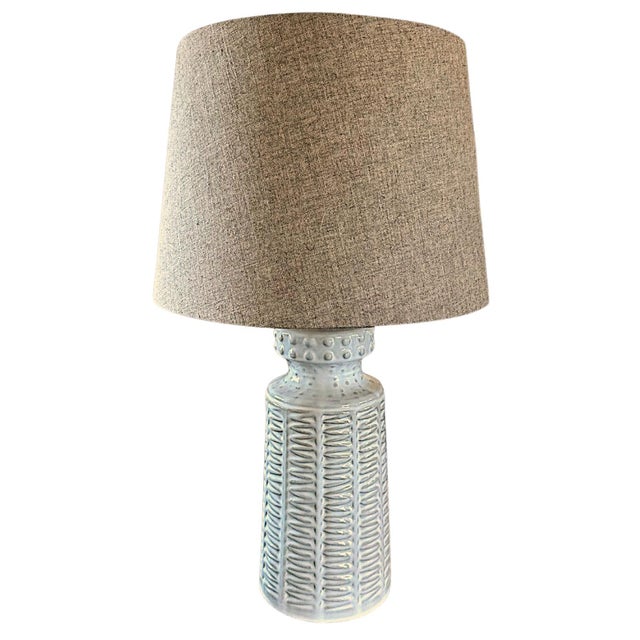 Inspired by the soft elegance of a cottage along the coast, this contemporary table lamp adds a touch of sophistication to...