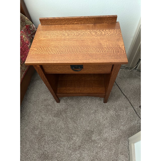 Mission style solid oak nightstand. Built by Amish furniture builder Schrock's Furniture.Like-new condition. Dimensions:...