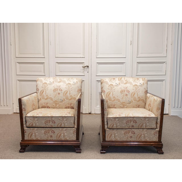 A refined pair of Swedish Grace lounge club armchairs dating from the 1930s, showcasing the elegant craftsmanship and...