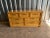 Late 20th Century vintage faux bamboo and faux woven rattan 7-drawer dresser with brass pulls and glossy laminate “wood”...