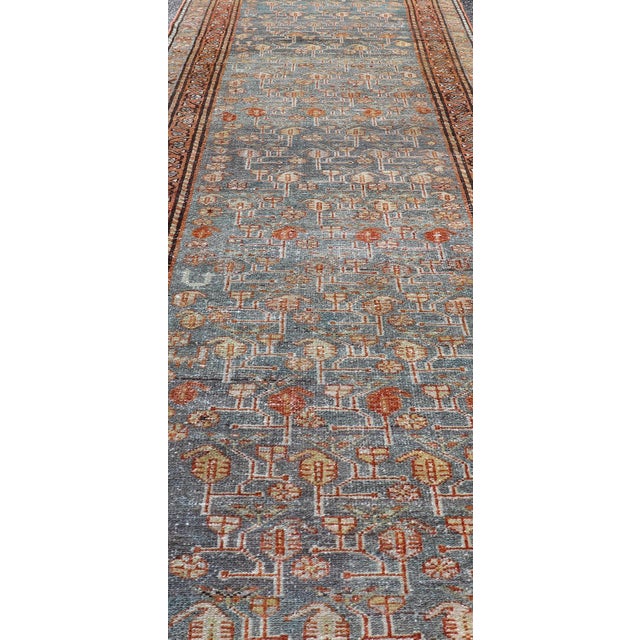 Measures: 2'10" x 9'3" Antique Persian Malayer Runner with Blue Field and Floral Design 2'10" x 9'3" Keivan Woven Arts /...