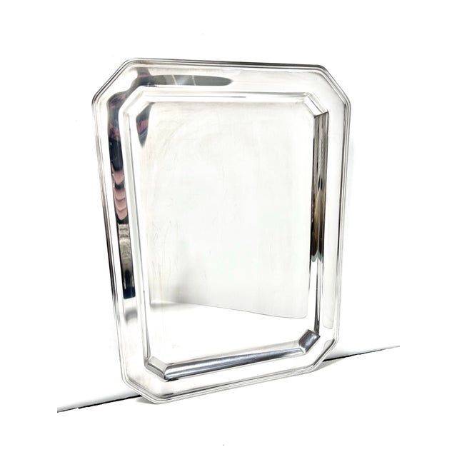 A striking Italian modernist serving tray by Georgian House, crafted in high-quality 18/10 stainless steel with a...