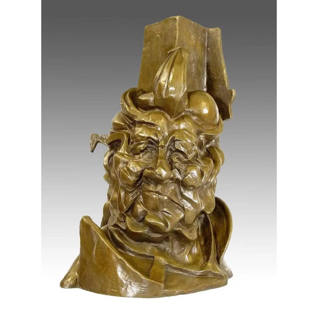 The fractured head, built from twisting planes and angular rhythms, embodies the energy and dissonance of modern life. A...