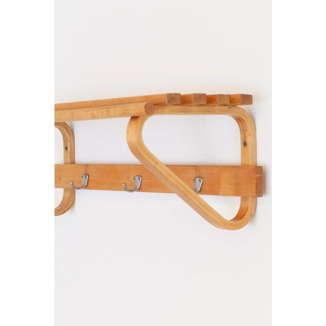 The coat rack model 109C was designed by Alvar Aalto in the 1930s. The piece on offer is an early version from the 1950s,...