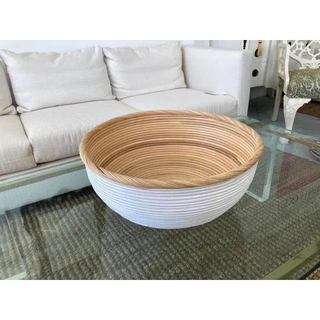 Beautiful white and natural rattan center piece. We have two of these pieces in stock, and also another similar pair in a...