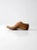 Antique early 20th century wooden shoe form, featuring a slender, elongated profile. The piece is marked “8” at the top...