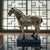 A late twentieth-century Chinese Tang Dynasty-style decorative horse sculpture, circa 1970–1999, cast in patinated metal...