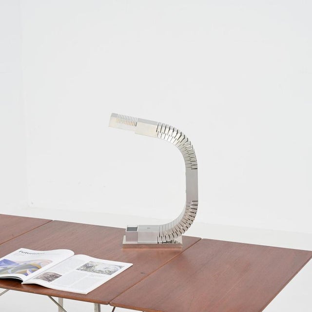 We attribute this lamp to Serge Mouille, a French industrial designer and goldsmith who was active around the 1950s....