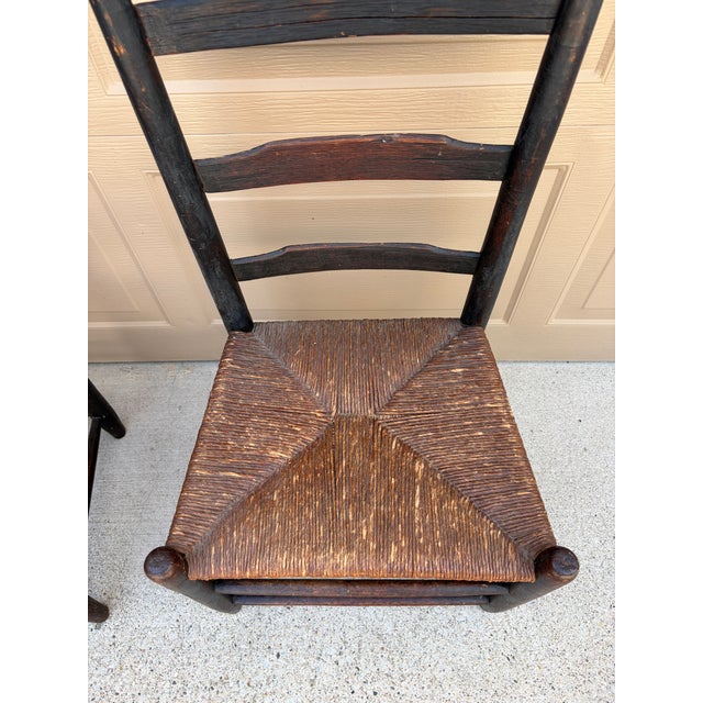 Pair of Antique Black Painted Shaker Ladder Back Chairs With Rush Seats For Sale - Image 10 of 18
