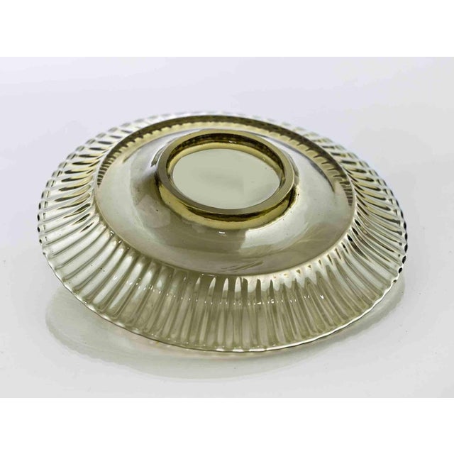 Vintage set of 19 art glass green plates realized in Italy in 1970s. Very good condition.