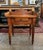Handmade early American side table or washstand featuring a single drawer, pegged construction, square nails, and turned...