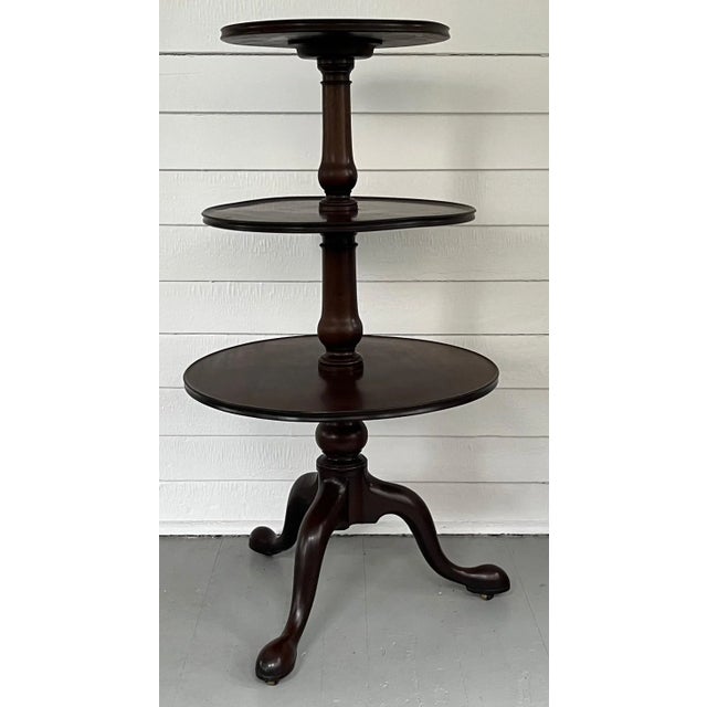 Antique 18th century George III mahogany graduated three tier dumb waiter side table or what not stand. Originally these...