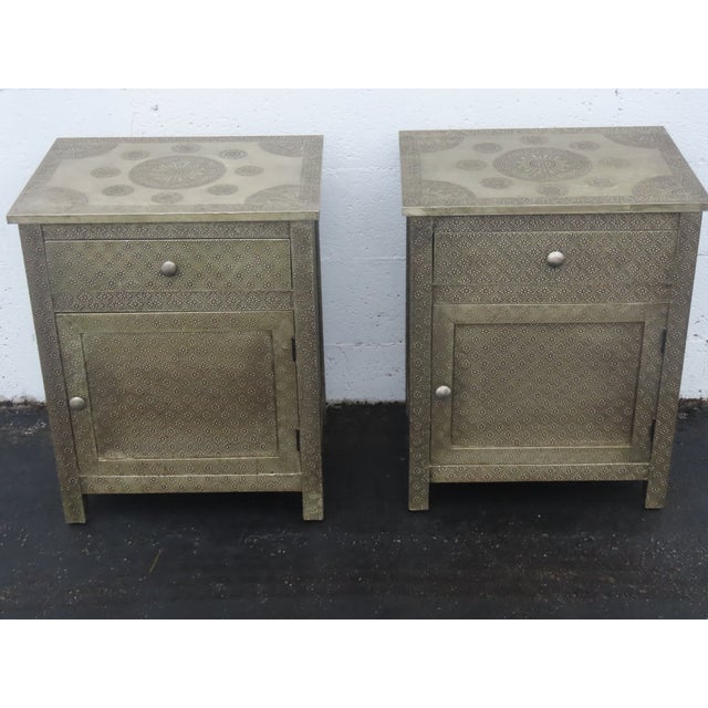 This magnificent Pair of Nightstands is made of wood, and metal. These beautiful matching pair of vintage bedside...