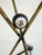 A playful vintage accent table inspired by the game of billiards, featuring an open tripod frame accented with oversized...