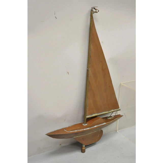 Vintage Folk Art Copper Sailboat Ship 38" Weathervane Hand Crafted. Circa Mid 20th Century. Measurements: 38" H x 26" W x...