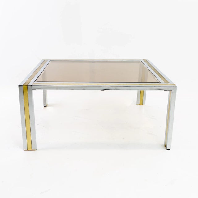 Renato Zevi Mid Century Italian Chrome Brass and Glass Square Coffee Table This table measures: 36 wide x 36 deep x 16...