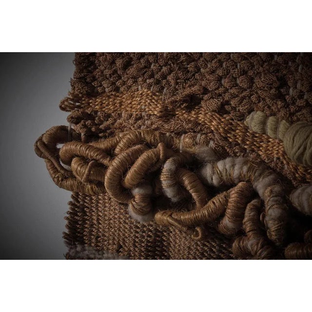 Impressive textured wall tapestry, Belgium 1970s. The tapestry is handwoven from different natural fibers and is exposing...